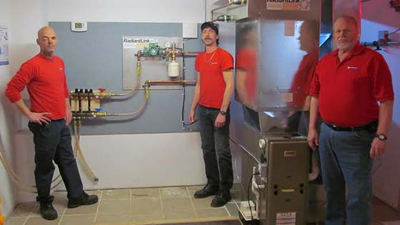 North American Trade Schools Instructors infront of a RadiantLink Unit