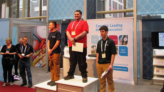 North American Trade School's Sean Nolan wins the HVAC System Technician competition at the 2014 CMPX
